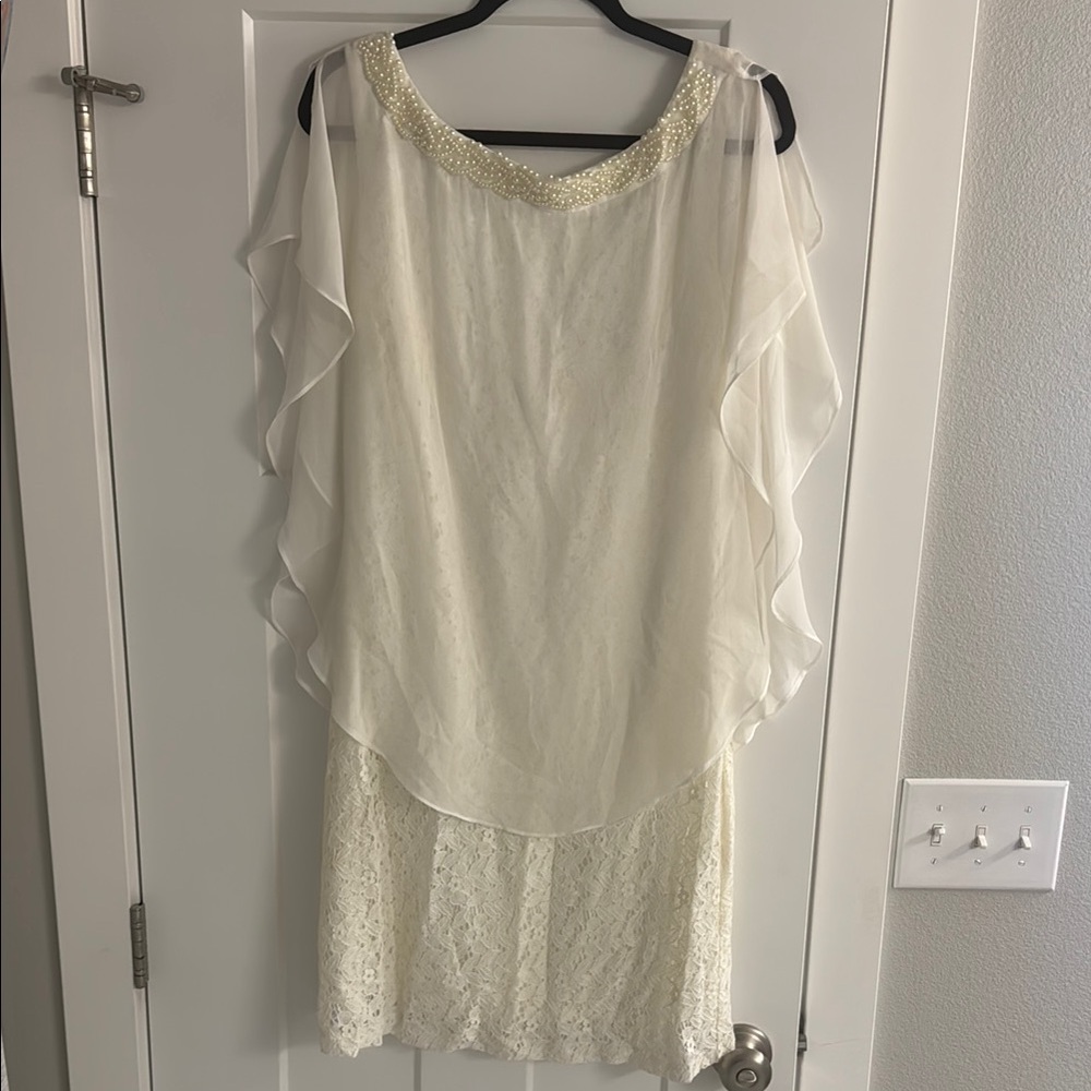 Elegant Cream Dress with Beaded Neckline